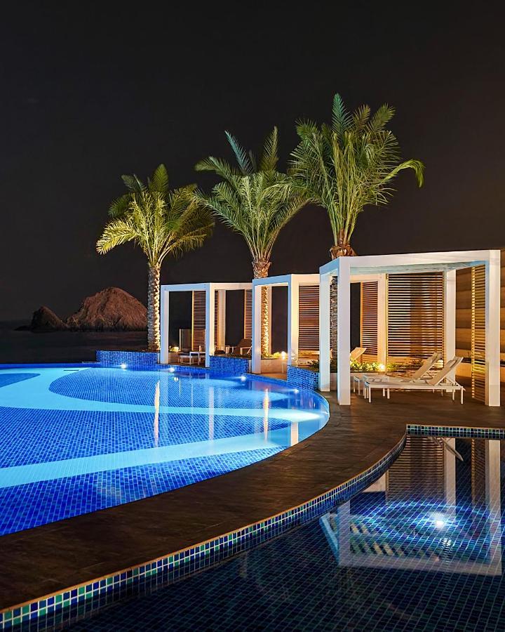 Royal M Al Aqah Beach Resort By Gewan Exterior foto The pool at the Westin Abu Dhabi