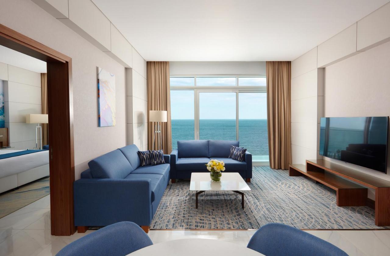 Royal M Al Aqah Beach Resort By Gewan Exterior foto A living room at the hotel