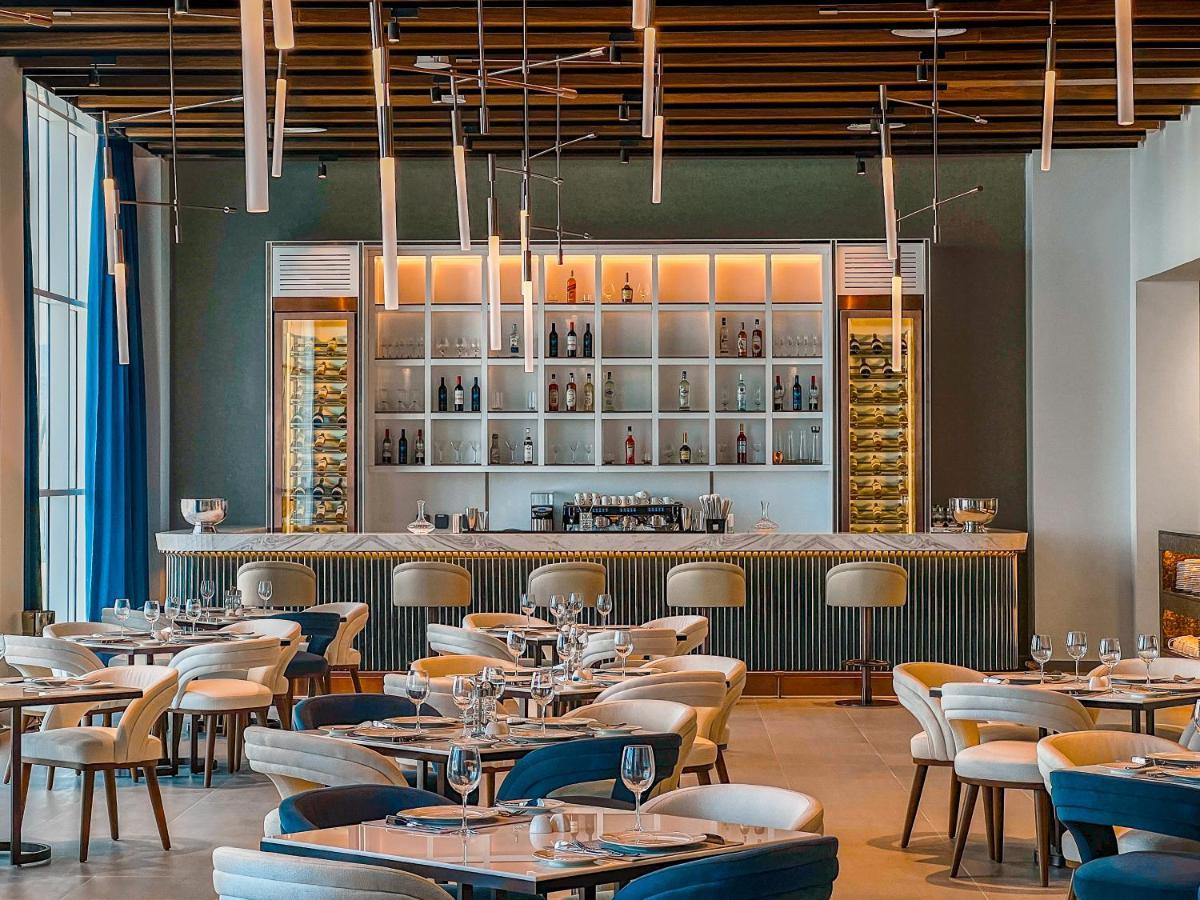 Royal M Al Aqah Beach Resort By Gewan Exterior foto The restaurant's interior