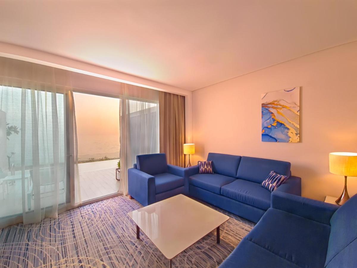 Royal M Al Aqah Beach Resort By Gewan Exterior foto Living room