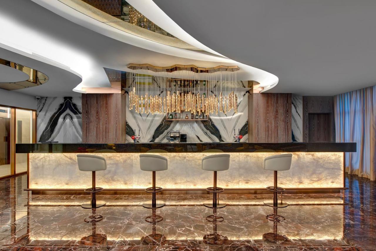 Royal M Al Aqah Beach Resort By Gewan Exterior foto The bar at the 101 lounge