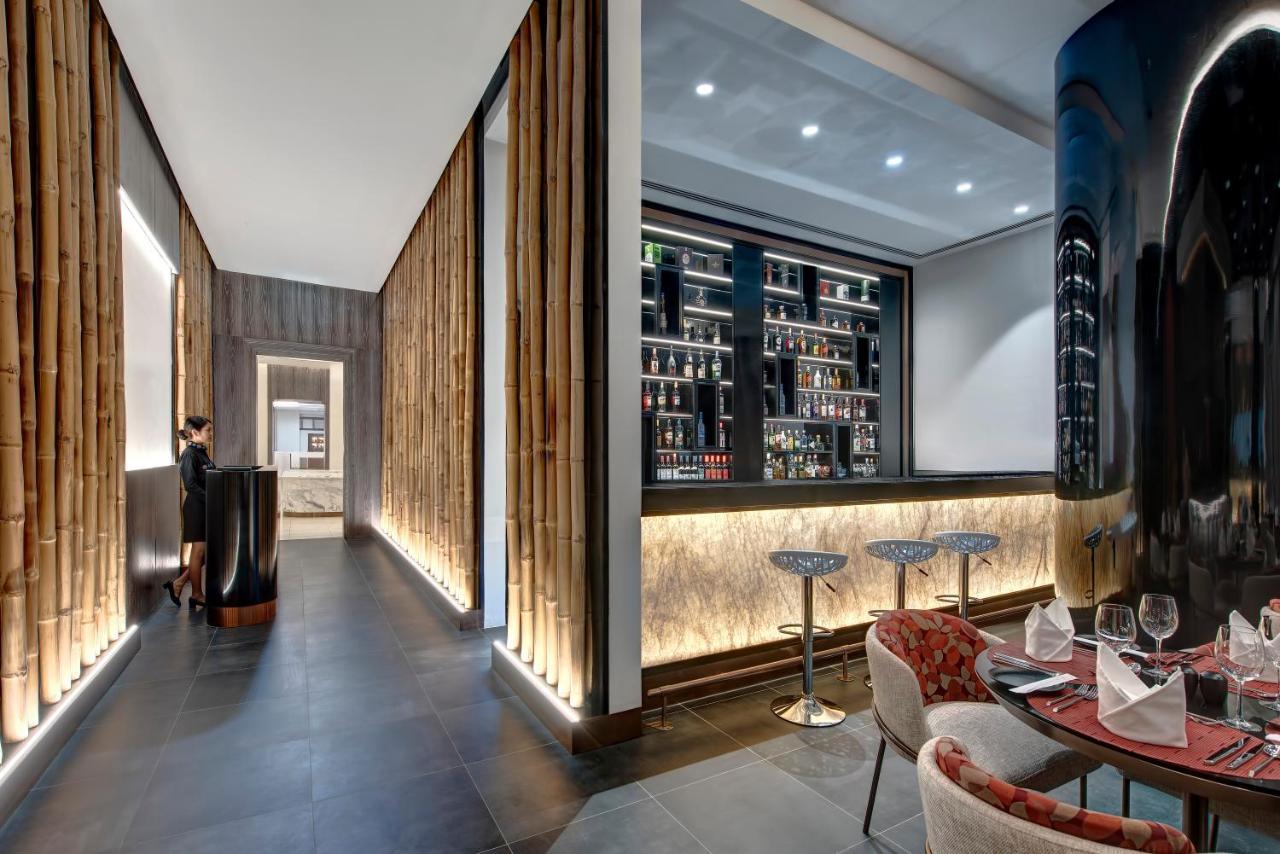 Royal M Al Aqah Beach Resort By Gewan Exterior foto The bar at the restaurant