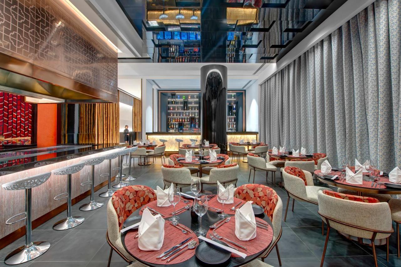 Royal M Al Aqah Beach Resort By Gewan Exterior foto The interior of the restaurant